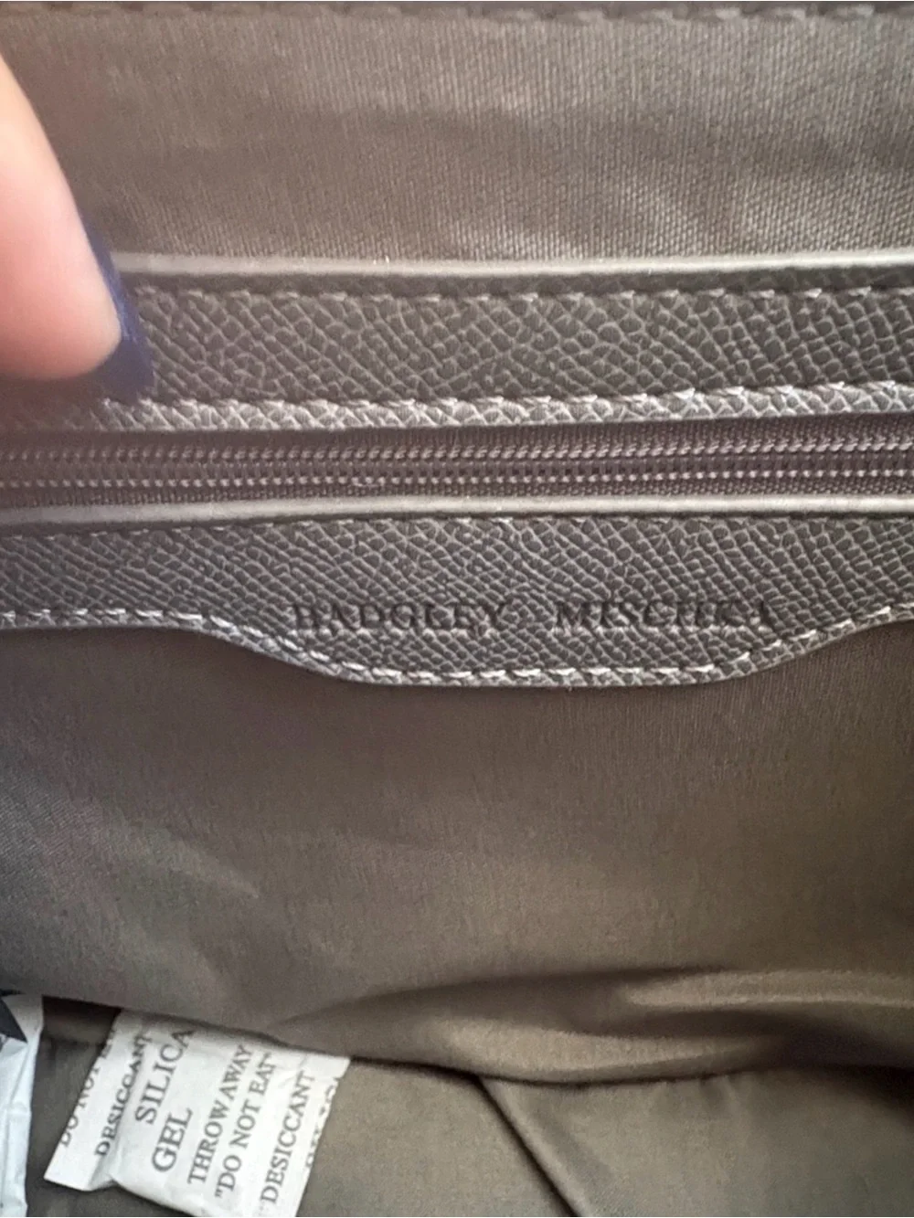 Badgley Mischka flap logo